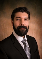 Headshot for Associate Earvin Reinhardt